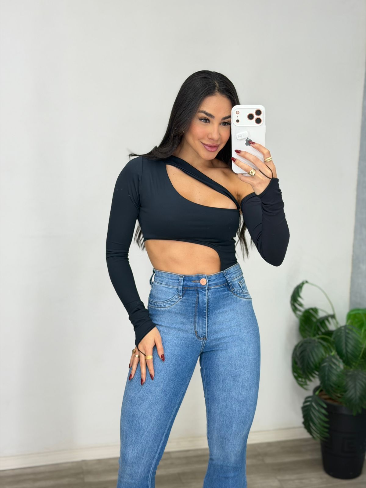 Calça flare média